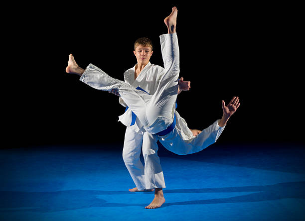 istock Children martial arts fighters 613554638