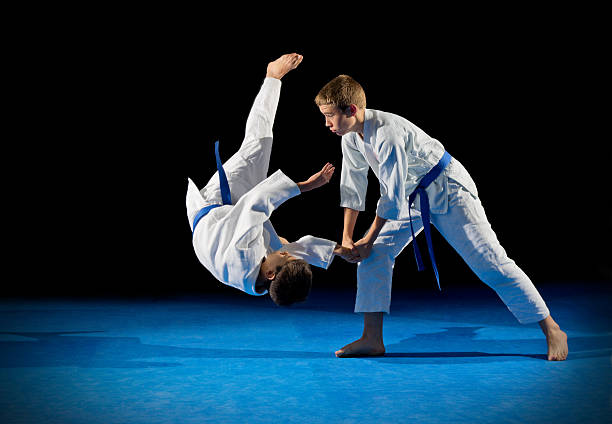 istock Children martial arts fighters 613554712
