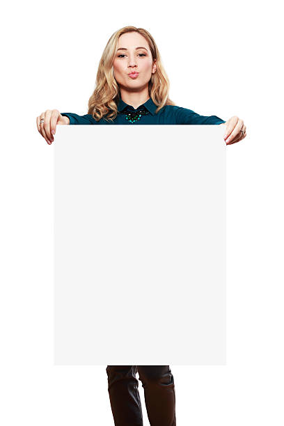 Smiling woman with big blank board . Close up female face portrait with arms on blank card.