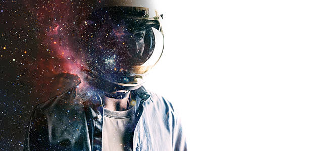 Man in helmet with starry sky on shield stock photo