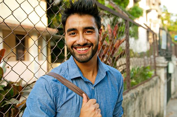 istock Portrait of a beautifull smiling man 613557404