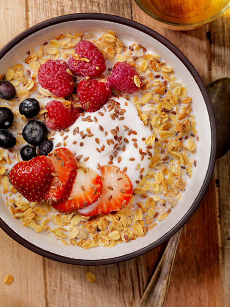 istock Hot 7 Grain Breakfast Cereal With Yogurt and Fresh Fruit 613557462