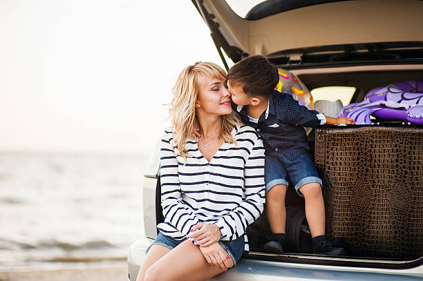 istock Mother and son near the machine. 613557586