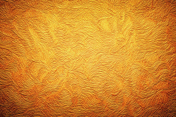 istock Gold background texture. Wallpaper on the wall. 613557920