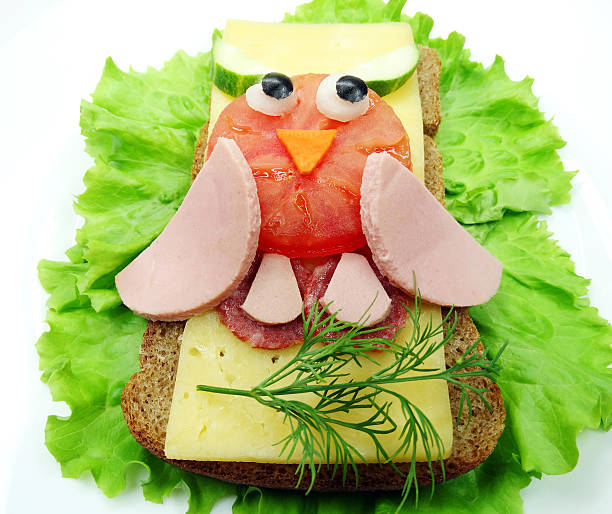 istock creative vegetable sandwich with cheese and sausage 613558170