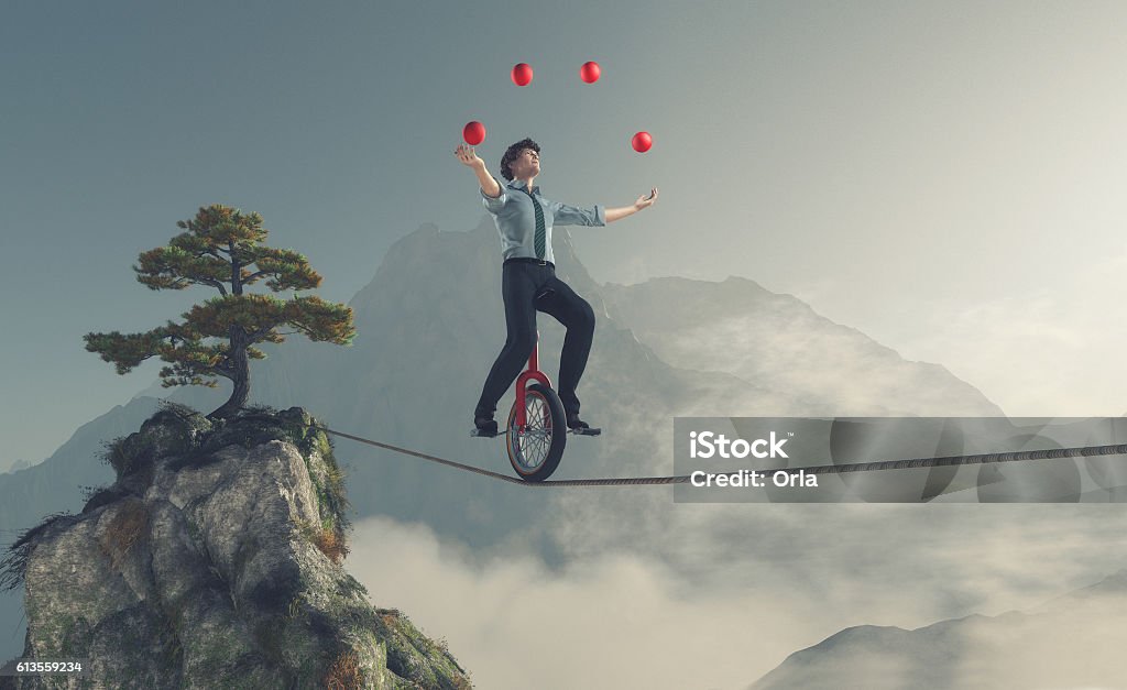 Young man as juggler Juggler is balancing on rope with a bike between two mountains. This is a 3d render illustration Juggling Stock Photo