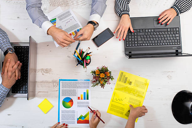 istock Group of people working in office 613559292