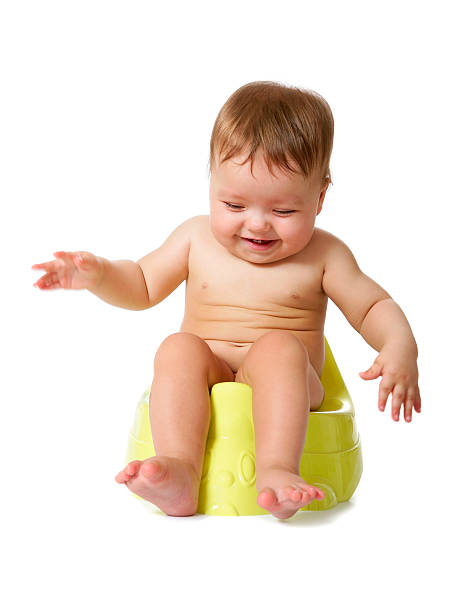 istock Funny baby on a potty 613560542