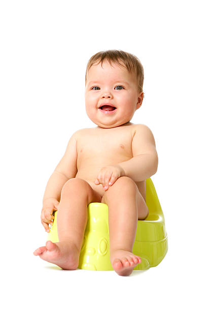 istock Funny baby on a potty 613560616