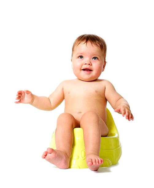istock Baby girl on a potty 613560646