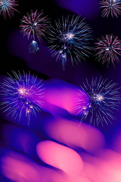 istock Fireworks and defocused lights on a black background 613562960