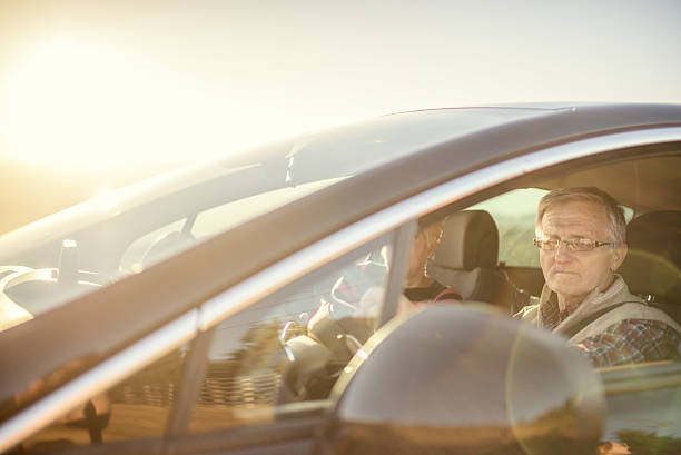 istock Senior couple enjoying a drive 613563736