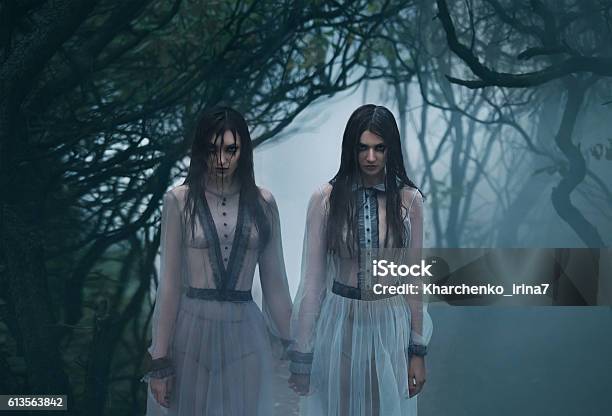 Creepy Lady With Long Black Hair Looking At You Stock Photo - Download Image Now - Forest, Spooky, Horror