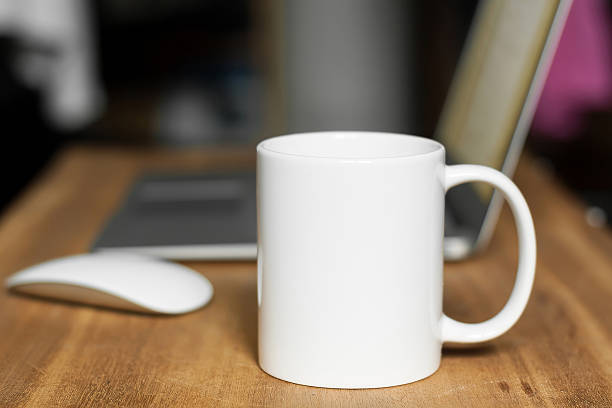 white mug on the desktop - white coffee mug imagens e fotografias de stock