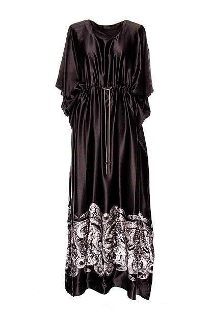 istock silk black dress on a white background 613650972