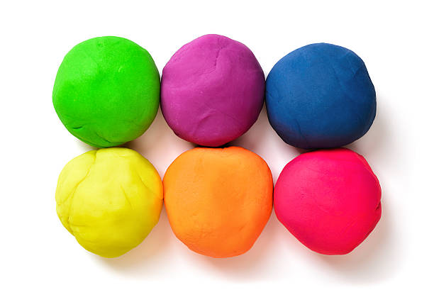 seis bolas de colores de arcilla de modelado sobre un fondo blanco - food child childs play clay craft fotografías e imágenes de stock