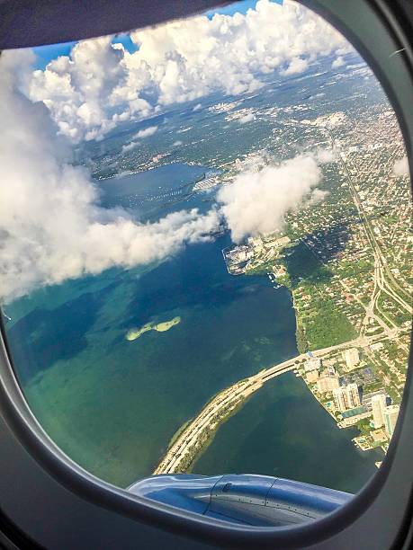 istock airplane view of tropical ocean 613651902