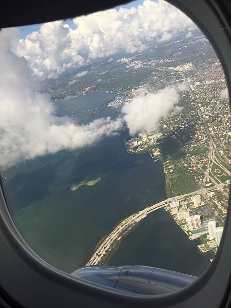 istock airplane view of tropical ocean 613652176