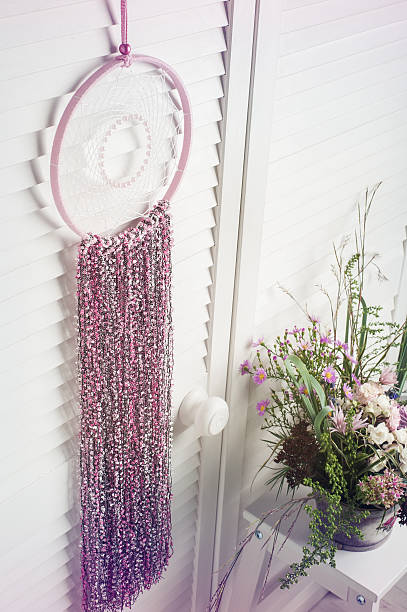 istock Pink dream catcher with flowers 613653218