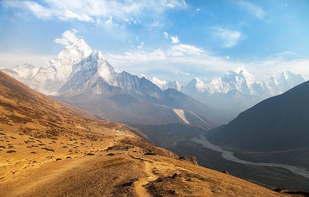 istock Evening panoramic view of mount Ama Dablam 613654648