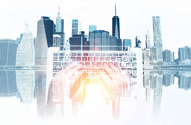 istock Man's hands and large city 613655252