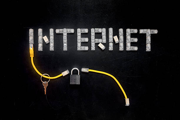 istock Word Internet made of  RJ45, padlock, key, patch cords 613655278