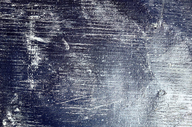 istock Shiny black sheet grunge old wall texture background stripes 613656014