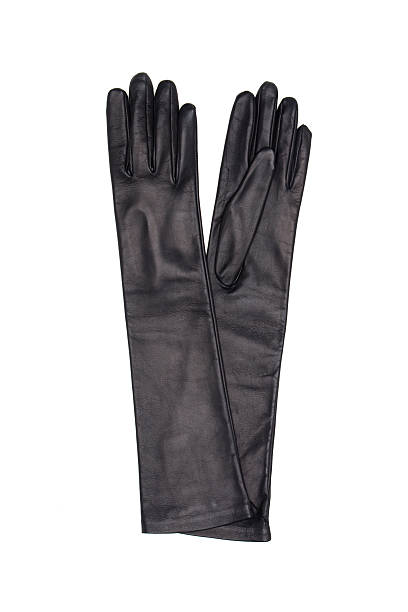 istock Black female leather gloves isolated on white background 613656692