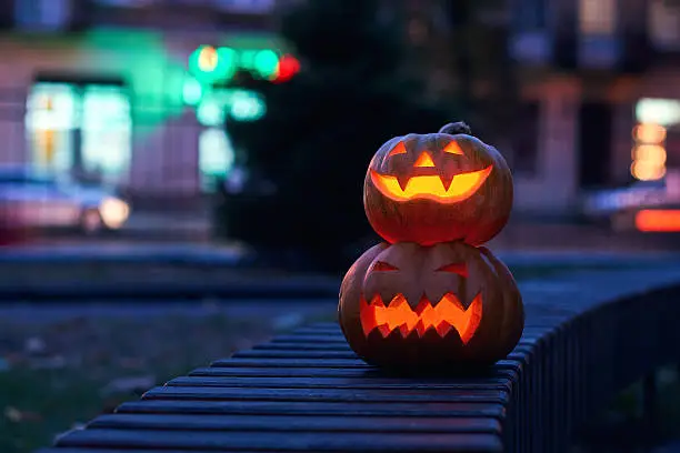 Photo of Halloween magic pumpkins at night