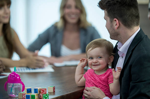istock Toddler with Her Dad at the Office 613657072