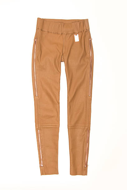 istock women's beige pants on a white background 613658244