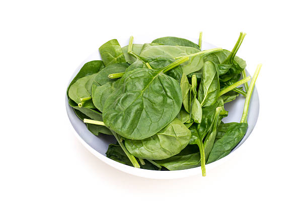istock Vegetables - Spinach Leaves Isolated on White 613661486