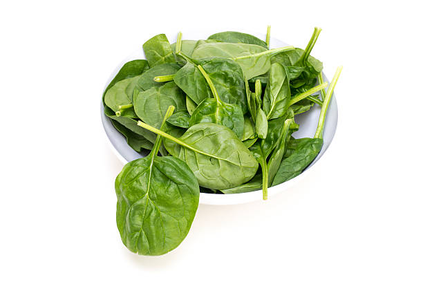 istock Vegetables - Spinach Leaves Isolated on White 613661536