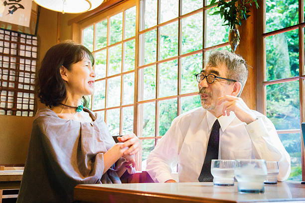 Business people applauding at a tavern