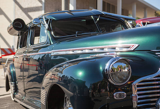 istock Part of a black old car with headlamp 613666246