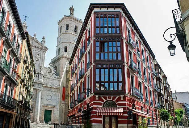 Building on the corner of the street and tower of the Cathedral in Valladolid,Castilla y Leon, Spain