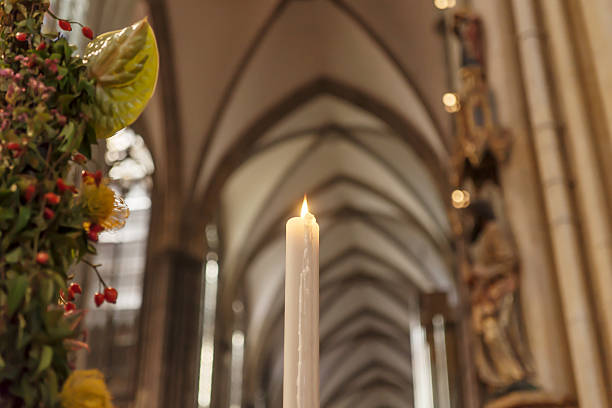 istock Candle in the Catholic Church 613669100