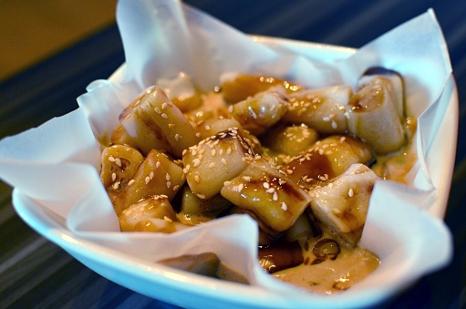 Chinese steamed rice rolls with sesame, serve with sweet sauce, chili sauce, soy sauce and  sesame paste