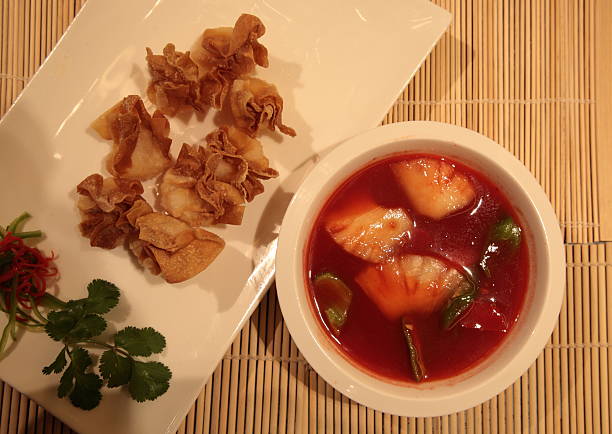 istock Deep fried wonton with sweet and sour sauce (油炸云吞) 613672436