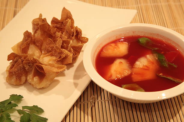 istock Deep fried wonton with sweet and sour sauce (油炸云吞) 613672484