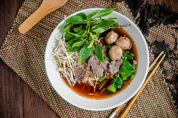istock asian noodle soup with beef meatball with fresh vegetable 613673342