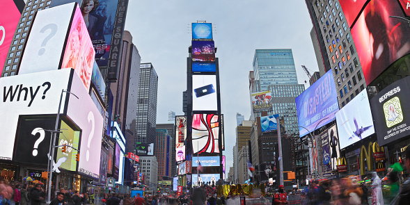 Times Square - often referred to as The Crossroads of the World - is a major commercial intersection in Manhattan.  Adorned with billboards and advertisements, it is one of the world's most visited tourist attractions.