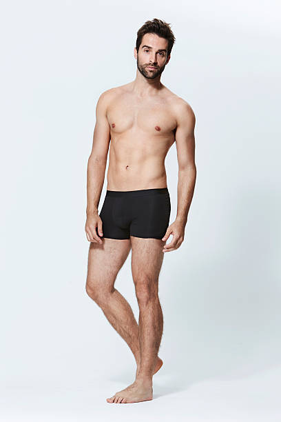 guy in unterwäsche - boxershorts stock-fotos und bilder