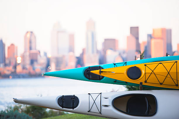 istock Kayaks stacked on rack on background of Seattle downtown 613675804