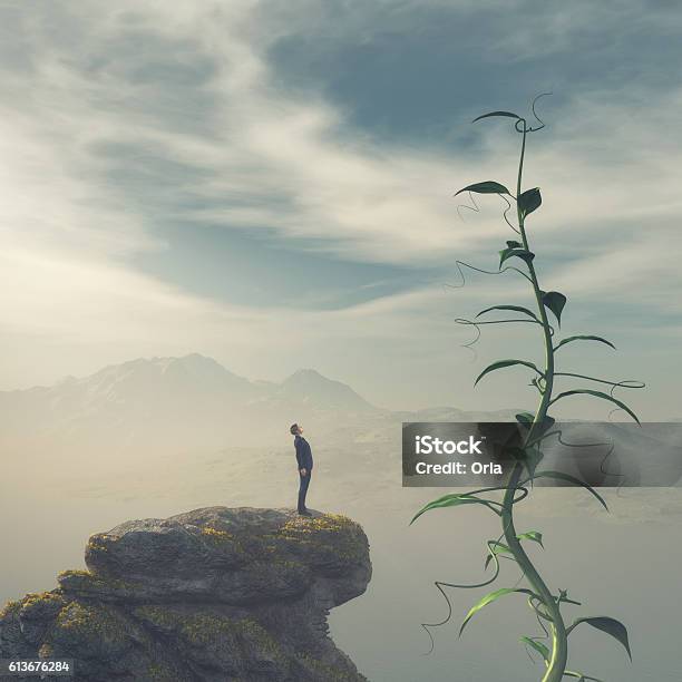 Man On The Edge Of A Cliff Stock Photo - Download Image Now - Beanstalk, Large, Cloud - Sky