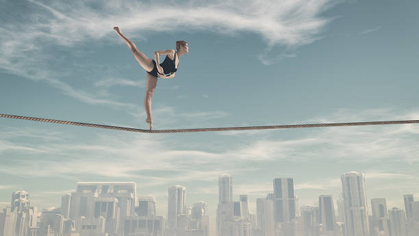 Woman sitting on a rope Athletic woman training on a rope over the town. This is a 3d render illustration tightrope stock pictures, royalty-free photos & images