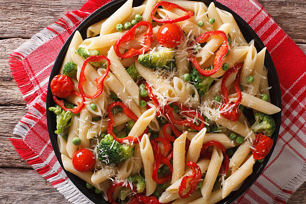 istock Primavera Italian pasta with vegetables closeup. horizontal 613678100