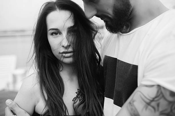istock beautiful couple at close angle 613678376