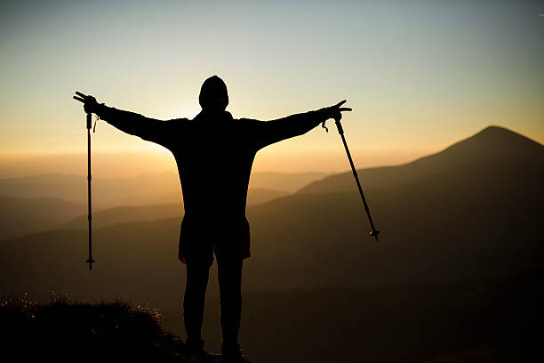 istock Silhouette of a climber on the high mountain. 613679856