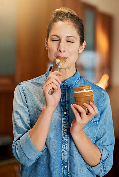 istock Savouring a spoonful of joy 613680504